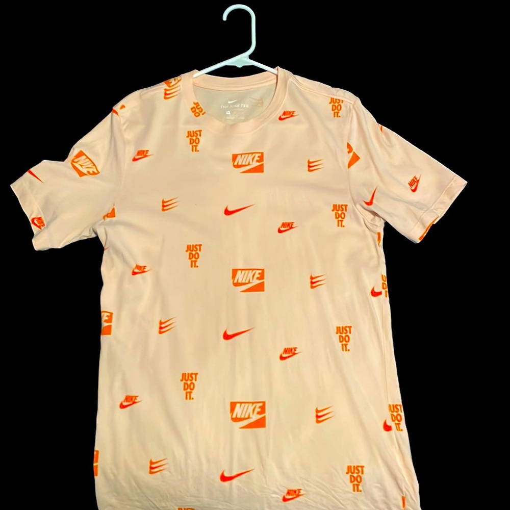 Size small- brand new- Nike printed shirt- pink & orange